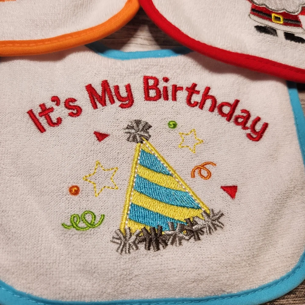My first holidays embroidered bib set